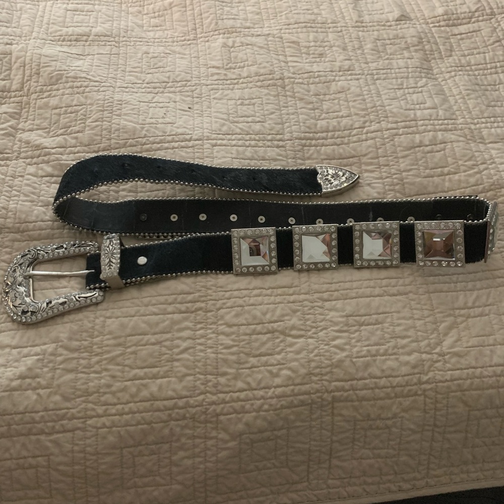 Women’s black leather Horse hair belt, 46 inches long, in great condition.